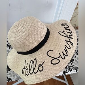 Off white floppy sun hat. “Hello Sunshine”. One size fits all. Minimal wear
